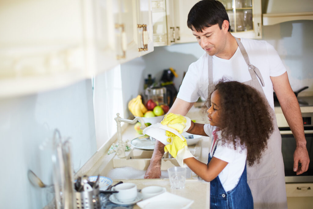Teaching Children To Wash The Dishes