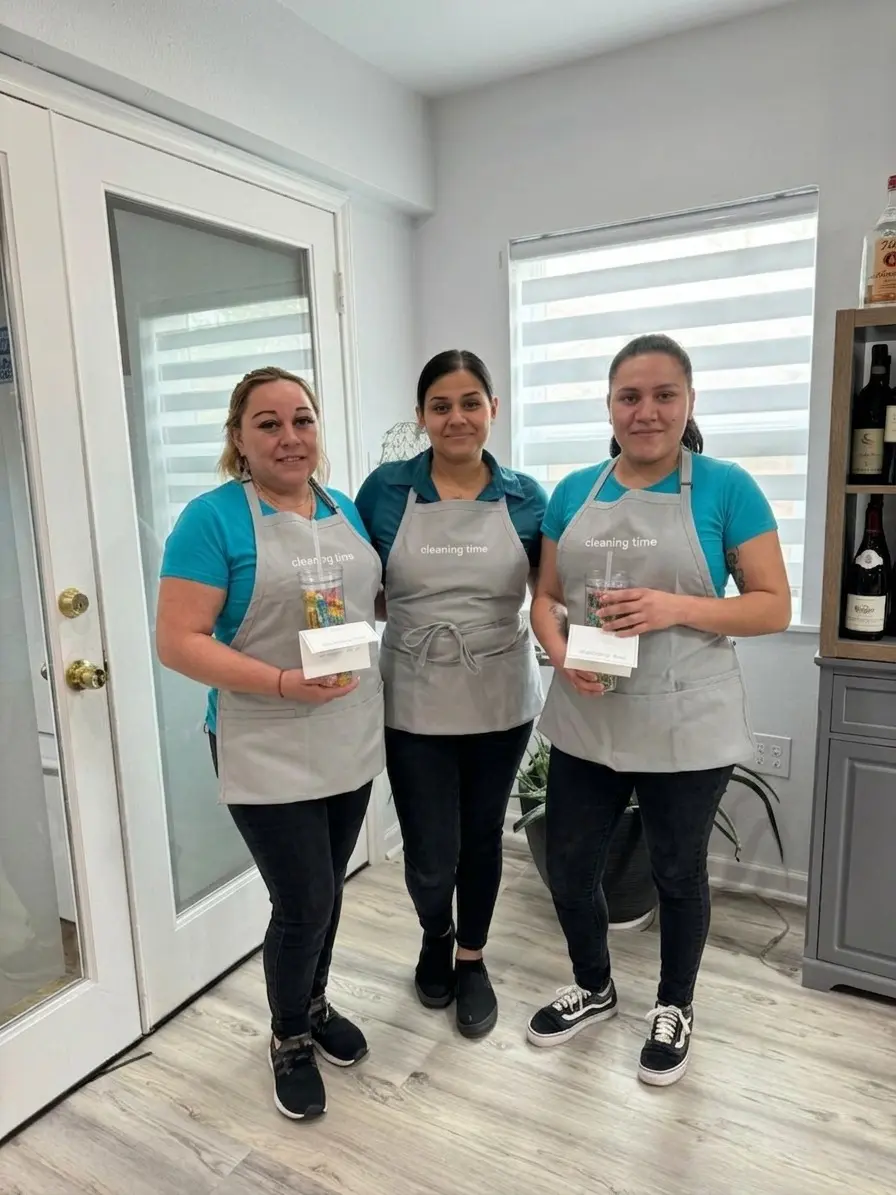Three cleaning team members standing together in uniform for the Join Our Team section in Austin