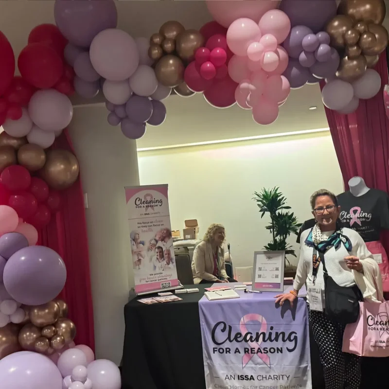 Cleaning for a Reason event booth in Austin TX with community support for cancer patients house cleaning services