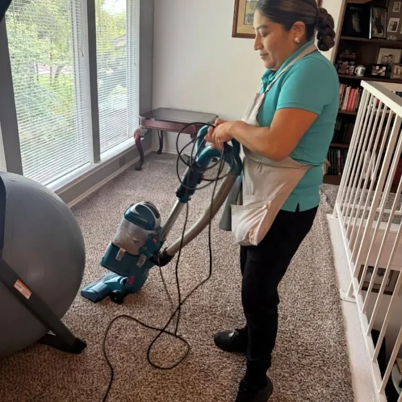Team member vacuuming